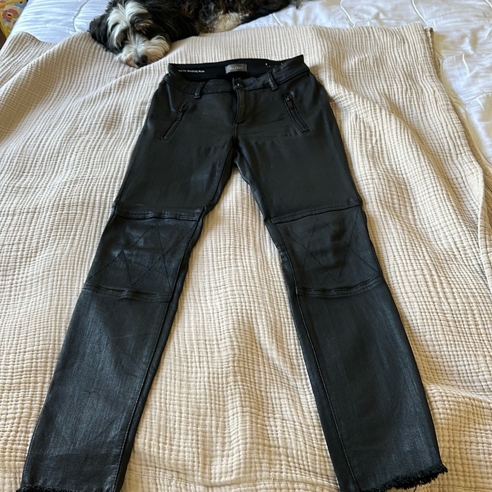 Black skinny jeans with a leather finish